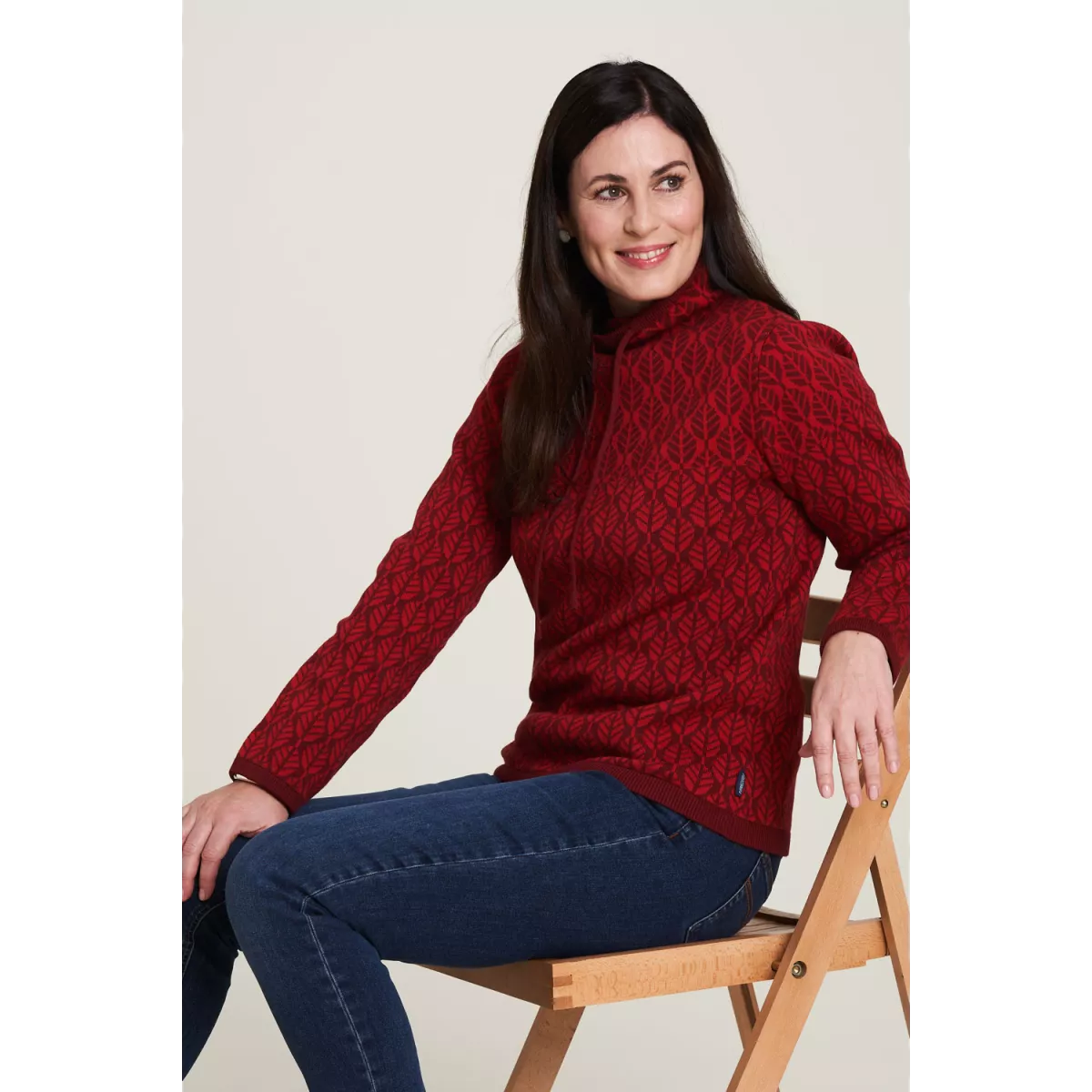 Pullover col roulé vert motif feuille 