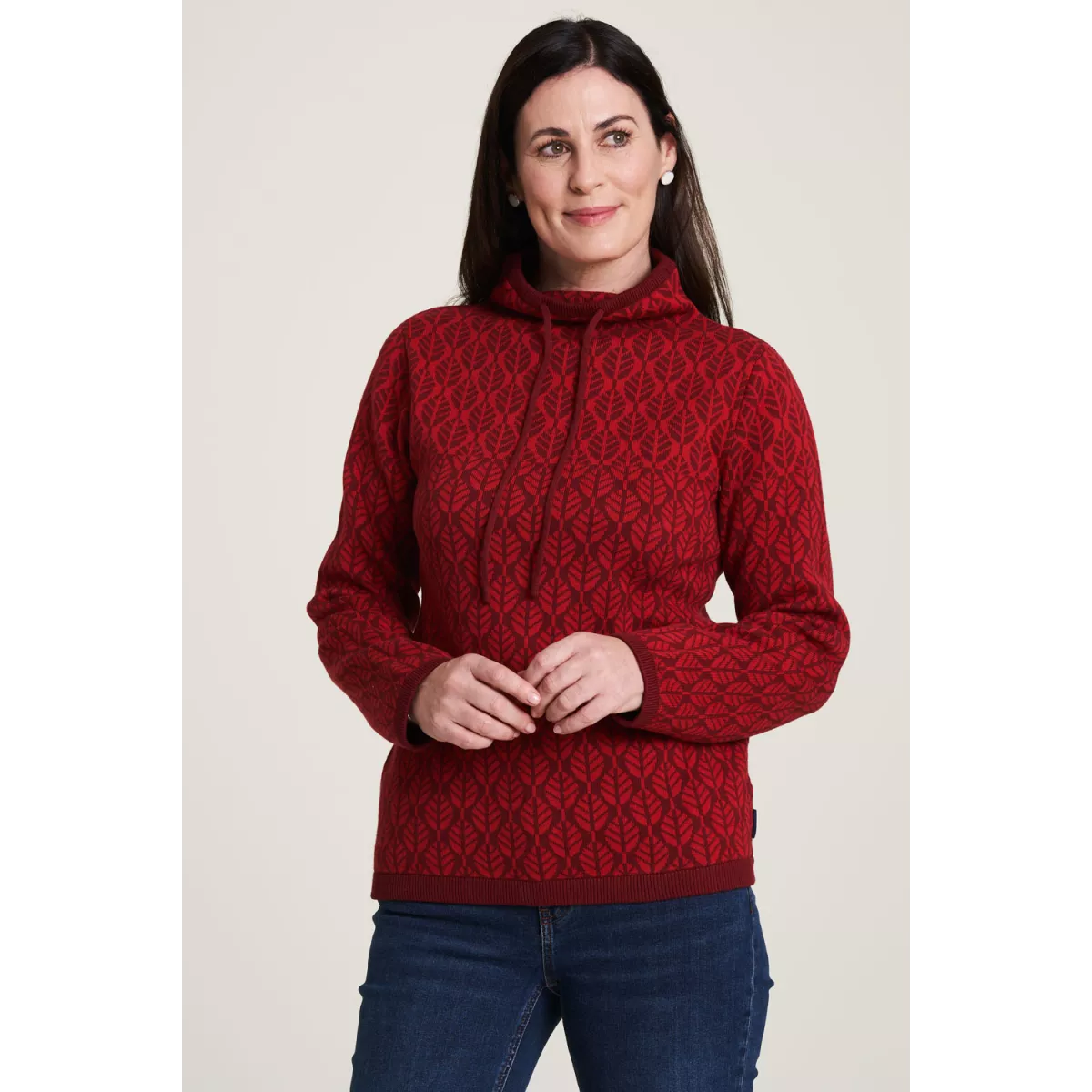Pullover col roulé vert motif feuille 