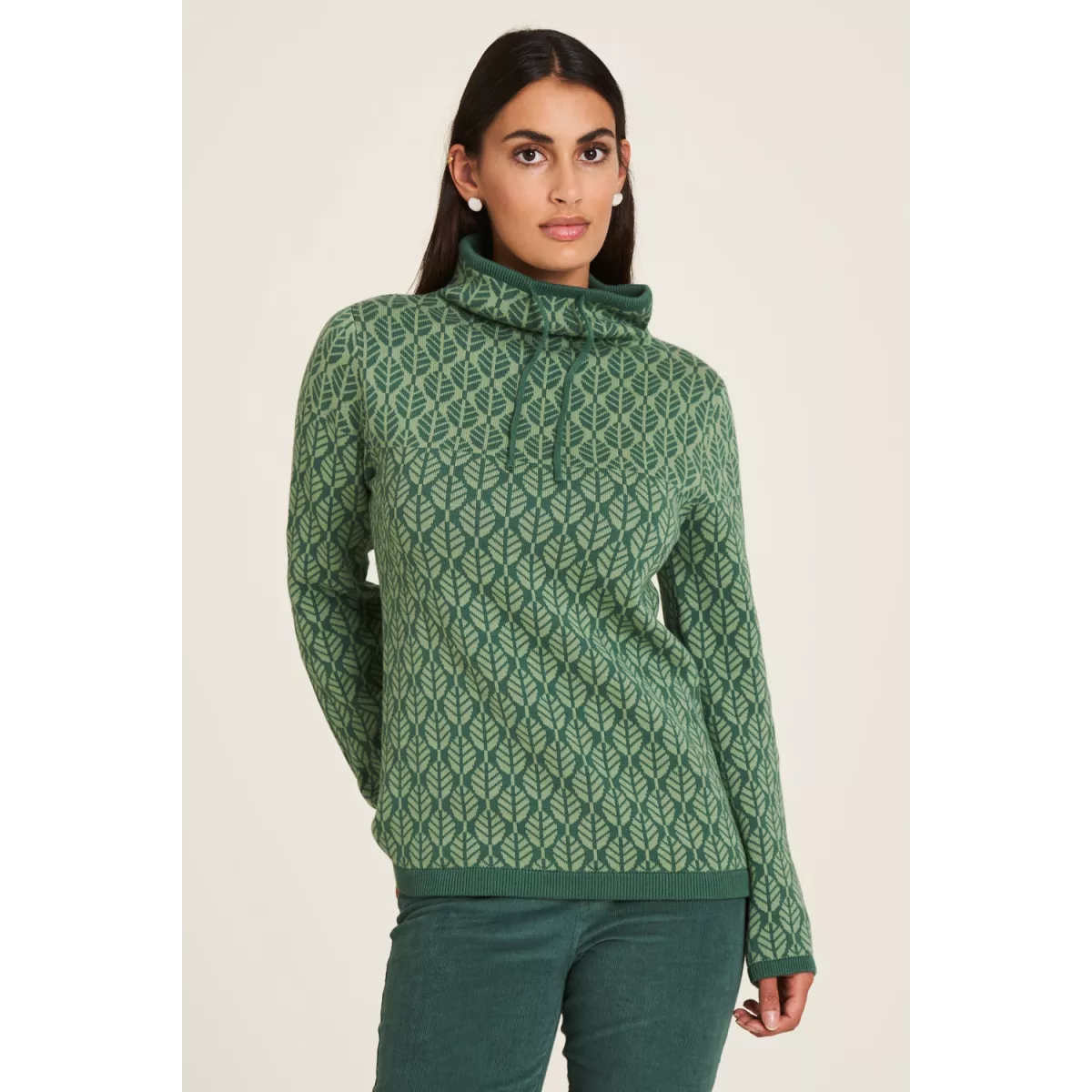 Pullover col roulé vert motif feuille 